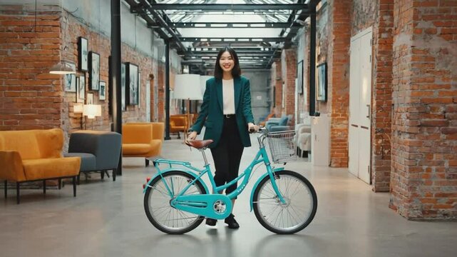 Office worker with a bike in the office.