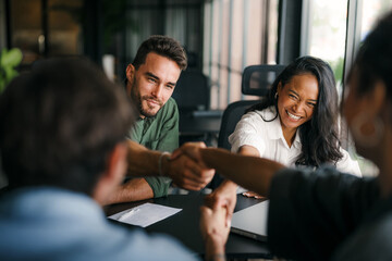 Success group of multiethnic entrepreneurs and business people achieving goals in corporate office