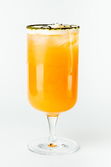 A vibrant orange cocktail in a tall clear glass with a salted rim, garnished with black sesame seeds. The drink is refreshing and visually striking, isolated on a white background.