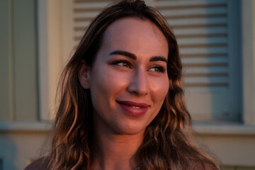 Israeli beauty with blonde hair and a red striped shirt on summer vacation in Tel Aviv