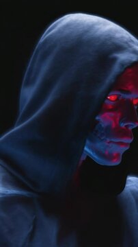 Hooded figure with visible skeleton depicting mortality and x ray vision for anatomy study