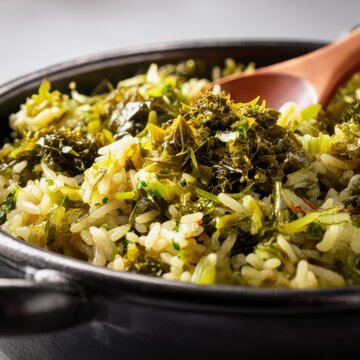 closeup shot ready to serve arroz de grelos food photography gourmet vibrant fresh ingredients razor shallow  clean background