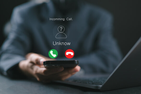 Fraud and Phishing Concept with Unknown Caller Alert. Woman displaying an incoming call from an unknown number, symbolizing fraud, phishing, and spam call warnings. Scammer or stranger, Prank caller