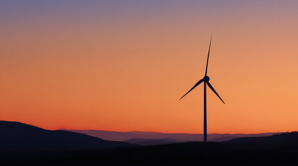 Obraz premium Wind turbine against sunset sky, symbolizing clean energy and sustainable future