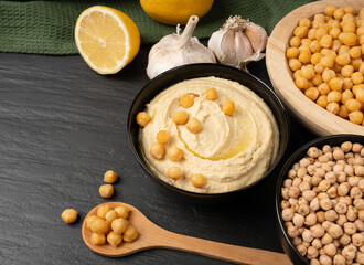 Hummus in bowl, houmous dip, chickpea humus tahini sauce, middle eastern spread
