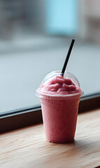 Glass of Berry Smoothie in Plastic Cup Isolated	