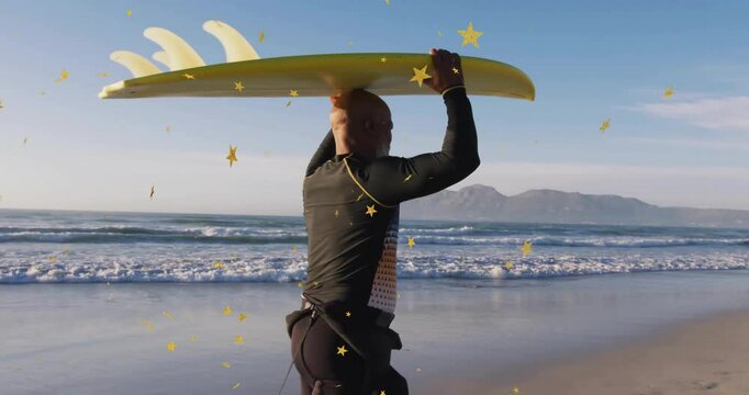 Surfer shifting weight and adjusting grip on longboard on beach, entering shallow water for surfing