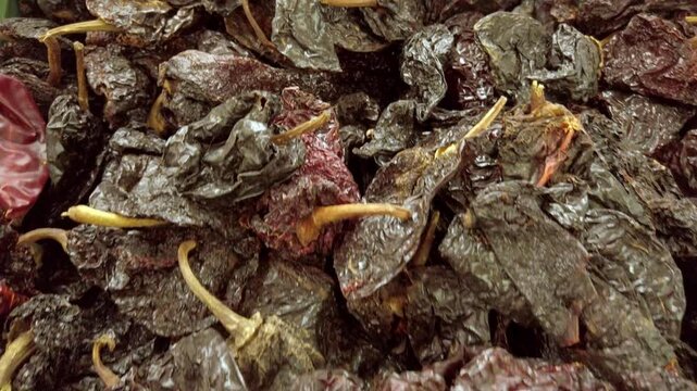 Pan down shot of dried poblano, indoor, close up shot