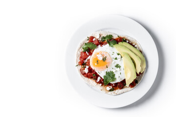 Huevos Rancheros isolated on white background. Traditional Mexican breakfast. Top view. Copy space