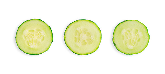 Top view of three round slices of raw juicy refreshing cucumber vegetable cross section isolated on white background used as ingredient for vegetarian healthy salads and fresh summer detox drinks