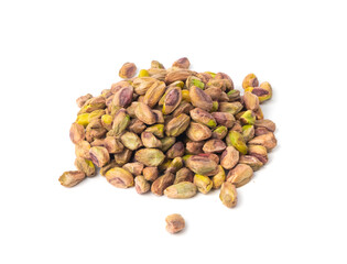 Fried salt pistachio nuts isolated. Baked pistachios pile, roasted green pistache fruits on white