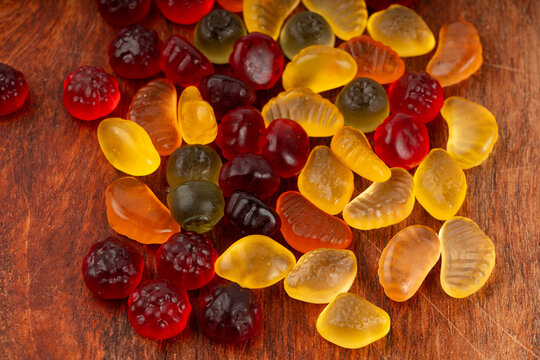 Fruit gummy candy pile, vegan chewing marmalade pills, jelly gumdrops heap