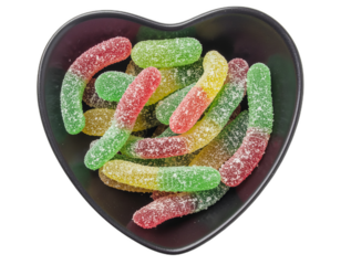 Sour Gummy Worms – Tangy and colorful gummy worms on black bowl isolated on white background. Suitable for marketing or business purposes. PNG file