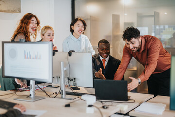 Group of business professionals brainstorming and sharing ideas in a modern co-working space, focusing on teamwork and project solutions.