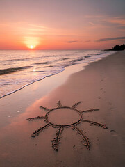 A serene beach scene with a sun drawing in the sand. Solstice, equinox, sunset, sunrise, summertime concept.  Selective focus.
