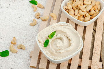 Homemade vegan cashew cheese. Raw healthy sauce in a bowl, lactose free food. Bio organic product