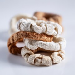 ecofriendly hair ties made from organic cotton symbolizing sustainable beauty accessories isolated