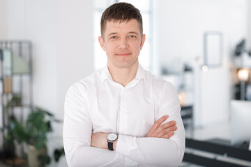 Portrait of handsome middle aged man indoors