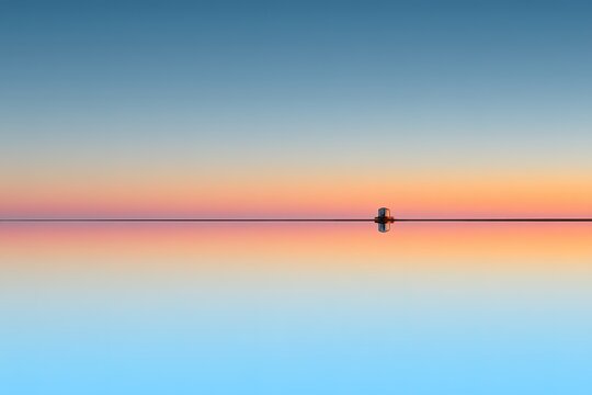 Peaceful Sunrise Reflection On Calm Water - Powered by Adobe