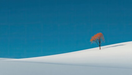 Solitary Orange Tree On Snowy Hill Under Vivid Blue Sky