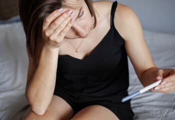 
Pregnancy test, result and surprise with woman at home for fertility reaction. Pregnant girl in...
