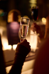 Glamorous woman at party with wine glass