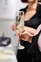 Close-up of woman holding wine glass