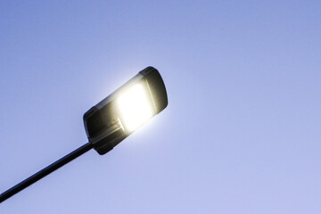 street lamp on blue sky