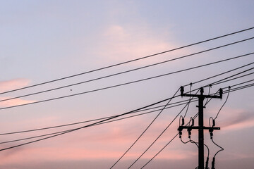 power lines against pastel sky
