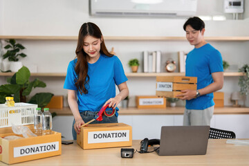 Volunteers packing donation boxes for community outreach