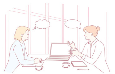 Two skilled professionals engaged in a thoughtful and productive discussion during a meeting in a modern office setting