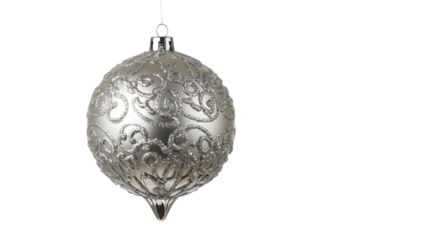 Ornate silver Christmas ornament hanging against a plain background, evoking festive spirit and holiday decor ideas