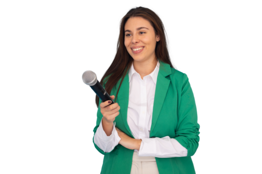 Confident presenter smiling, holding microphone, delivering dynamic speech during professional studio recording with transparent backdrop