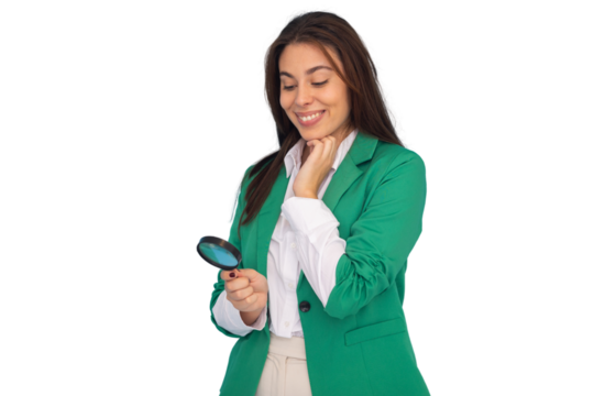 Smiling businesswoman using magnifying glass and looking at something interesting, isolated on transparent background