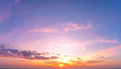Obraz premium Panoramic photo, view of a pink and purple sky at sunset. Sky panorama background, header and web banner
