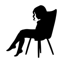Black silhouette of a girl, a child in a dress and with loose hair sits on a chair