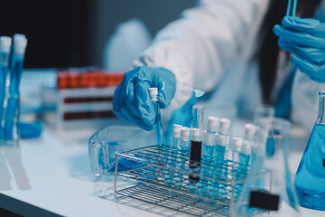 Research, experiment and medical trial being done by a scientist in a lab, science facility or...