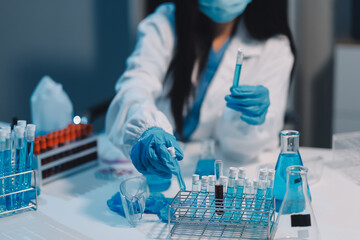 Research, experiment and medical trial being done by a scientist in a lab, science facility or...