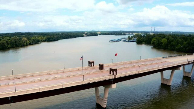 Aerial flyover over the Highway 109 bridge (Walter Durham Memorial Bridge) over Old Hickory Lake shot in 4K at 60 FPS.