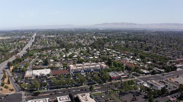 Aerial rising panning shot of Silicon Valley, California, the corporate headquarters for the most valuable companies in the world. 4K