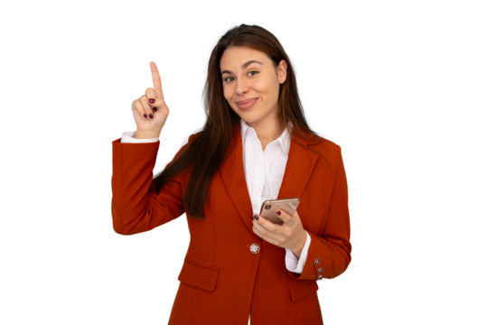 Businesswoman in orange suit holding smartphone and pointing up with index finger on transparent background - Powered by Adobe