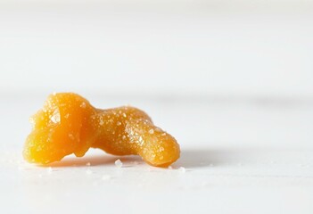 Photorealistic image of candied ginger with sugar crystals