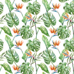 Green monstera leaves and strelitzia flowers seamless pattern. Hand drawn watercolor illustration isolated. For greeting cards, invitations, textiles, fabrics, wrapping paper, wallpapers, covers.