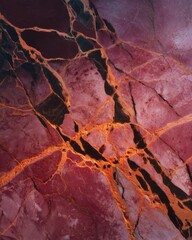 Rosso Levanto burgundy marble with glowing orange veins and stone texture