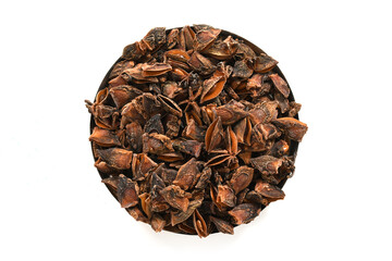 Whole Organic Star Anise. Aromatic Spice Closeup.Star Anise Pods. Natural Dried Spice on White Background. Star Anise Macro. Top View of Dried Star Anise. High-Resolution Stock Image.