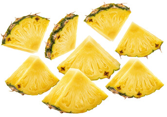 Freshly cut pineapple slices arranged artistically on a white background