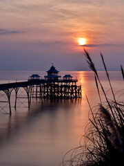 sunset on the famous Clevedon pier in England