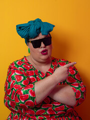 Cool plus size woman crossing arms with sunglasses