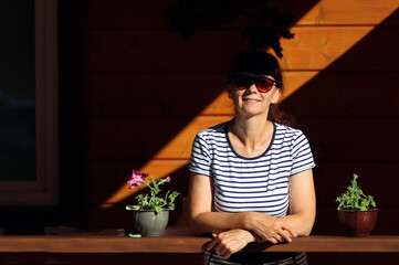 portrait of a woman sitting on the grass