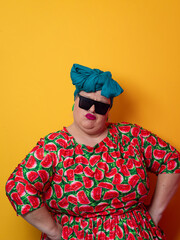 Cool plus size woman crossing arms with sunglasses